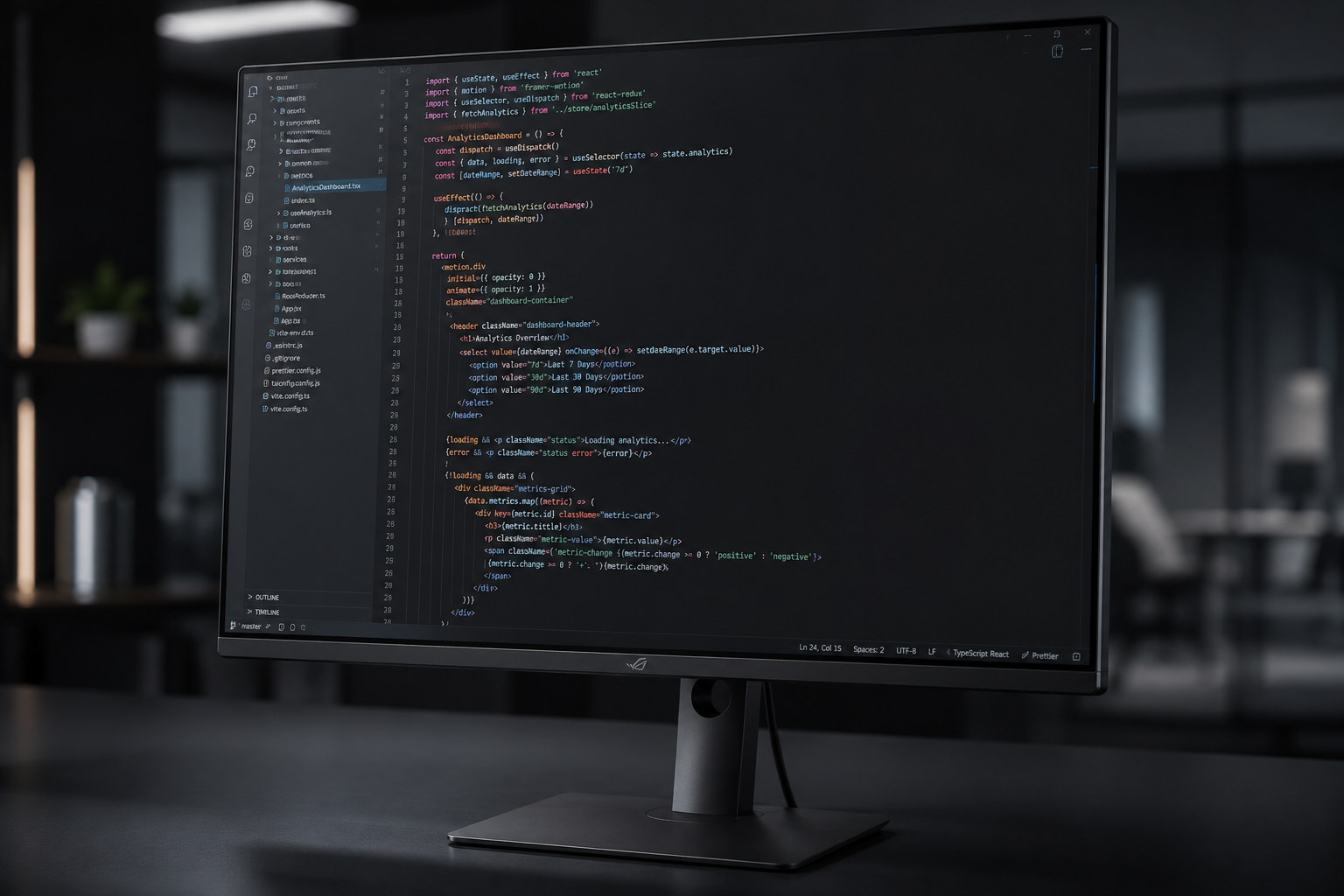 Clean dark-mode IDE interface on a high-end monitor representing scalable web development architecture for startups.